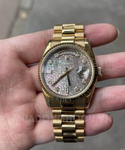 Đồng hồ Rolex Day Date 118238 vàng khối 18k mặt vi tính khảm ốc tím size 36mm